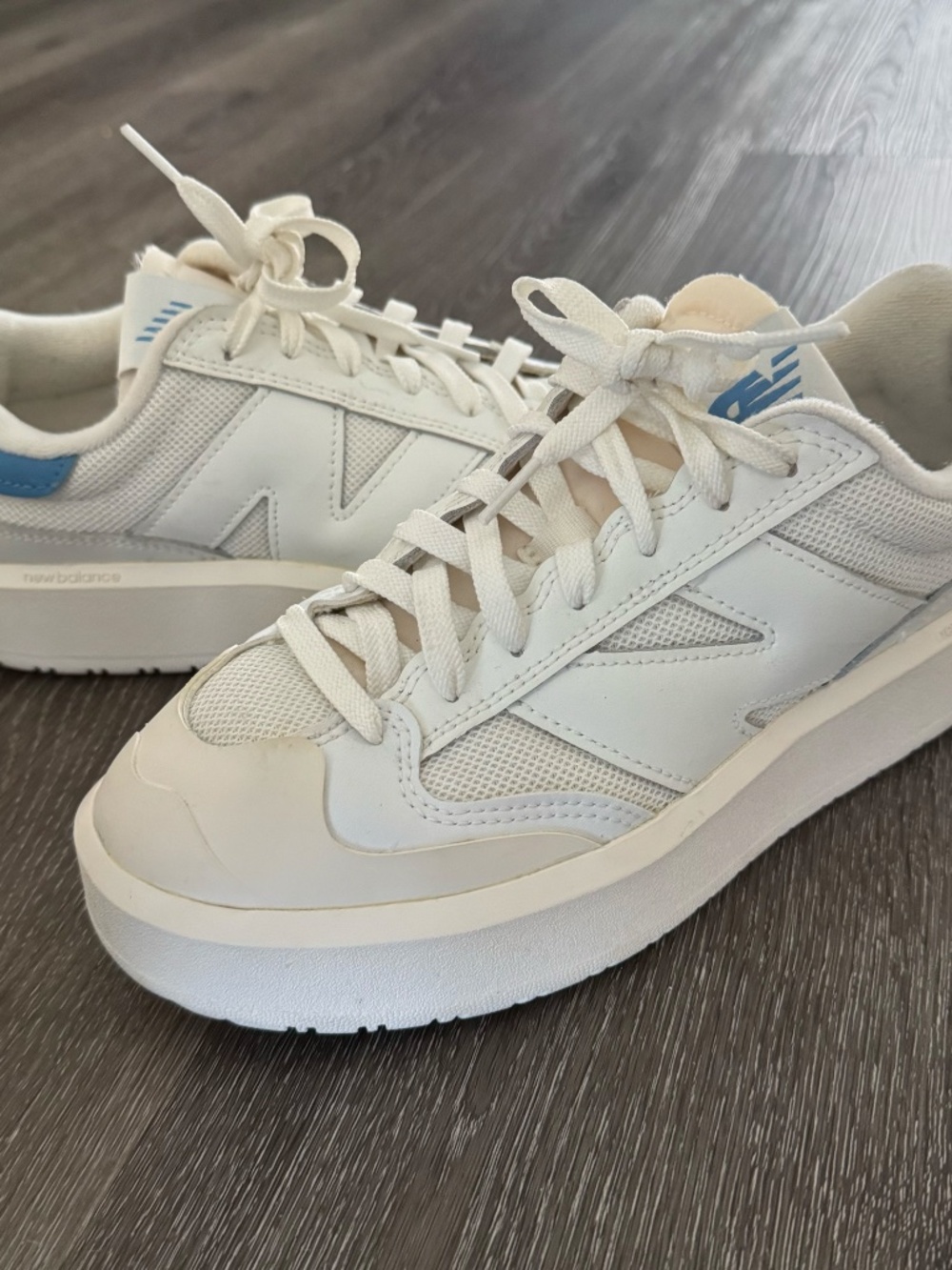 New Balance White Mesh & Leather Sneakers with Light Blue Accents